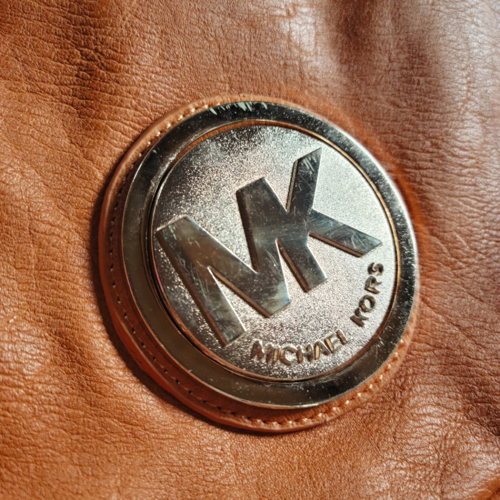 Michael Kors | Leather bag | Burnt orange | gold and silver hardware |